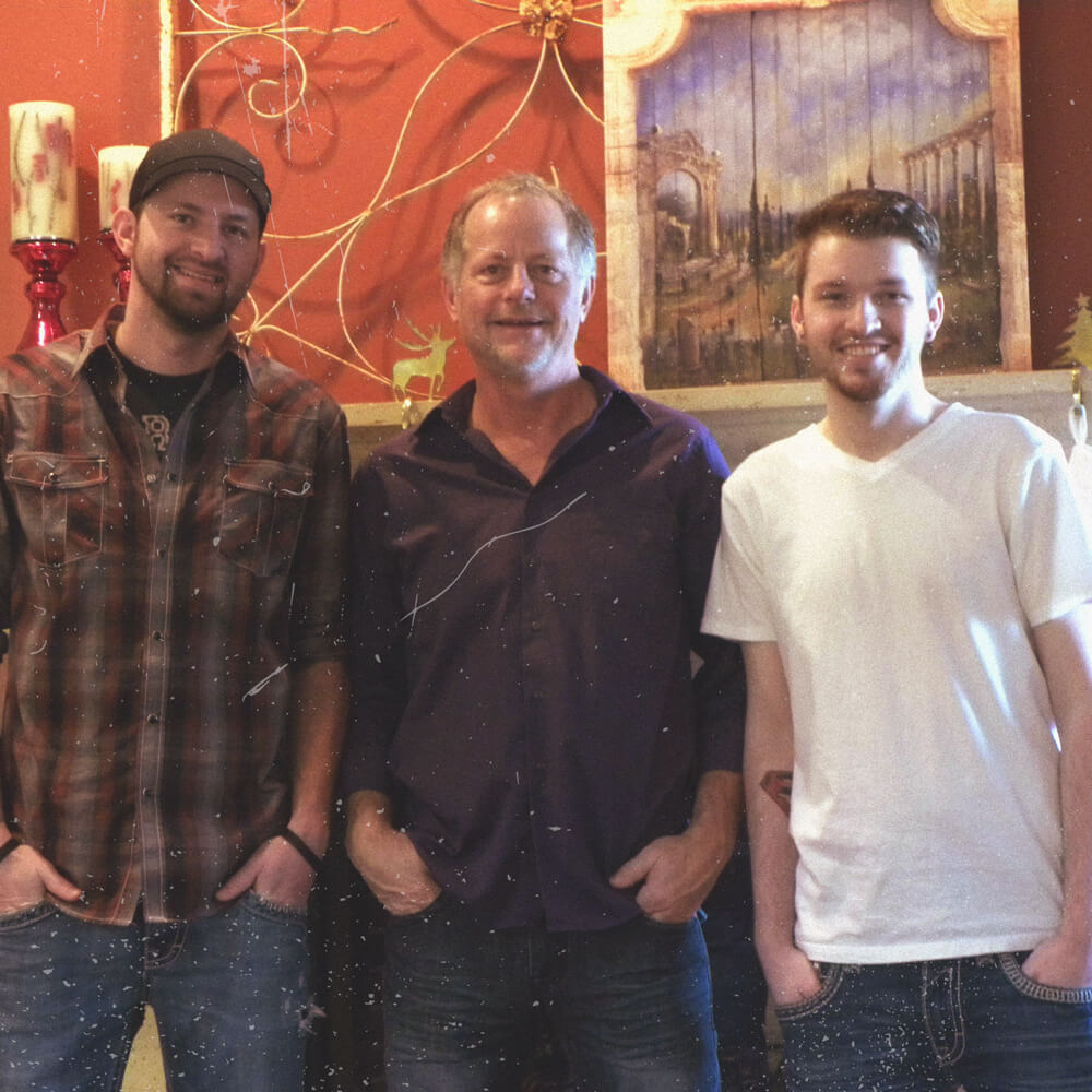 Christmas 2015 with brother, Colton, and father, Chuck